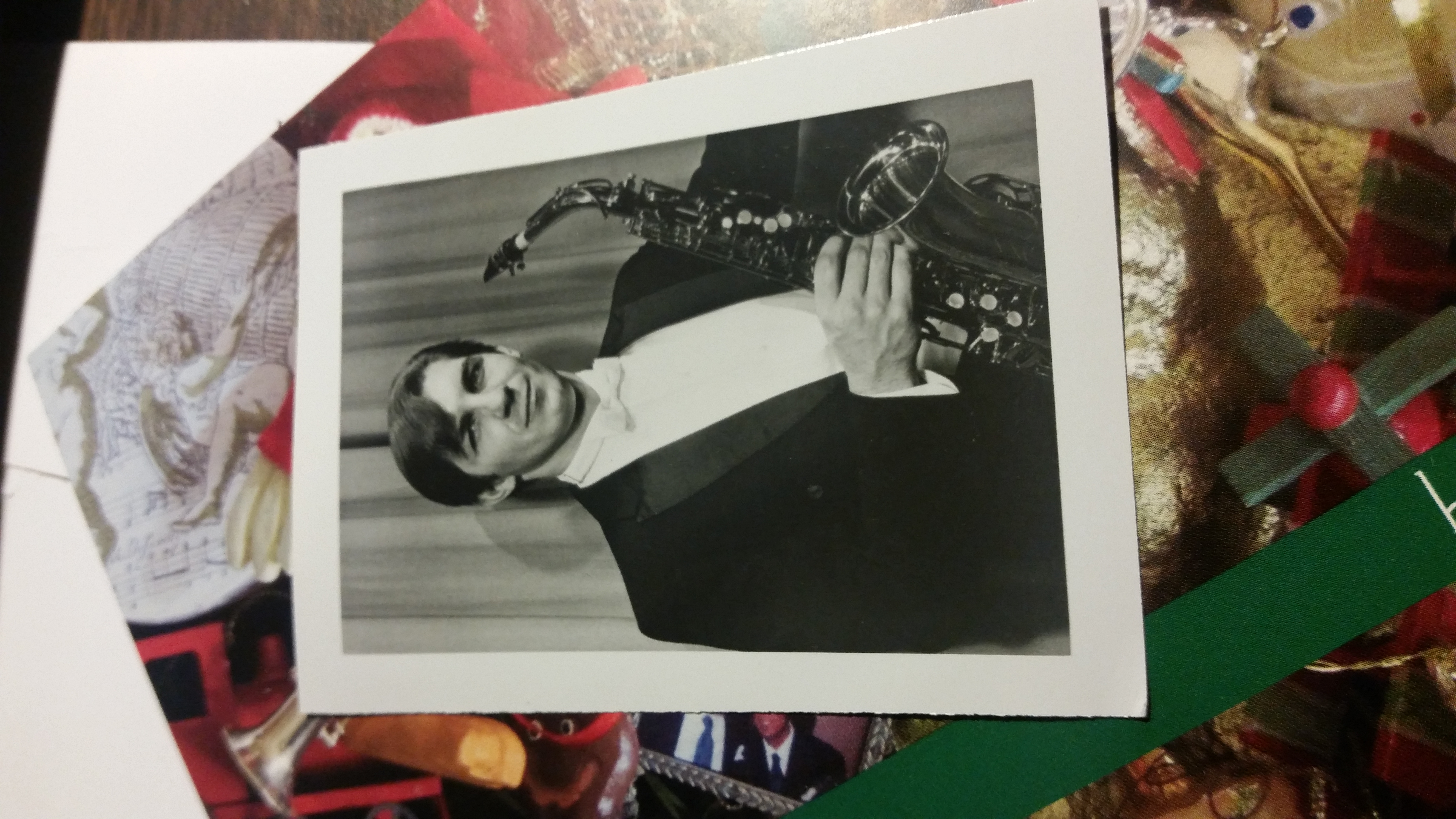 Professional picture of a young JL with his saxophone